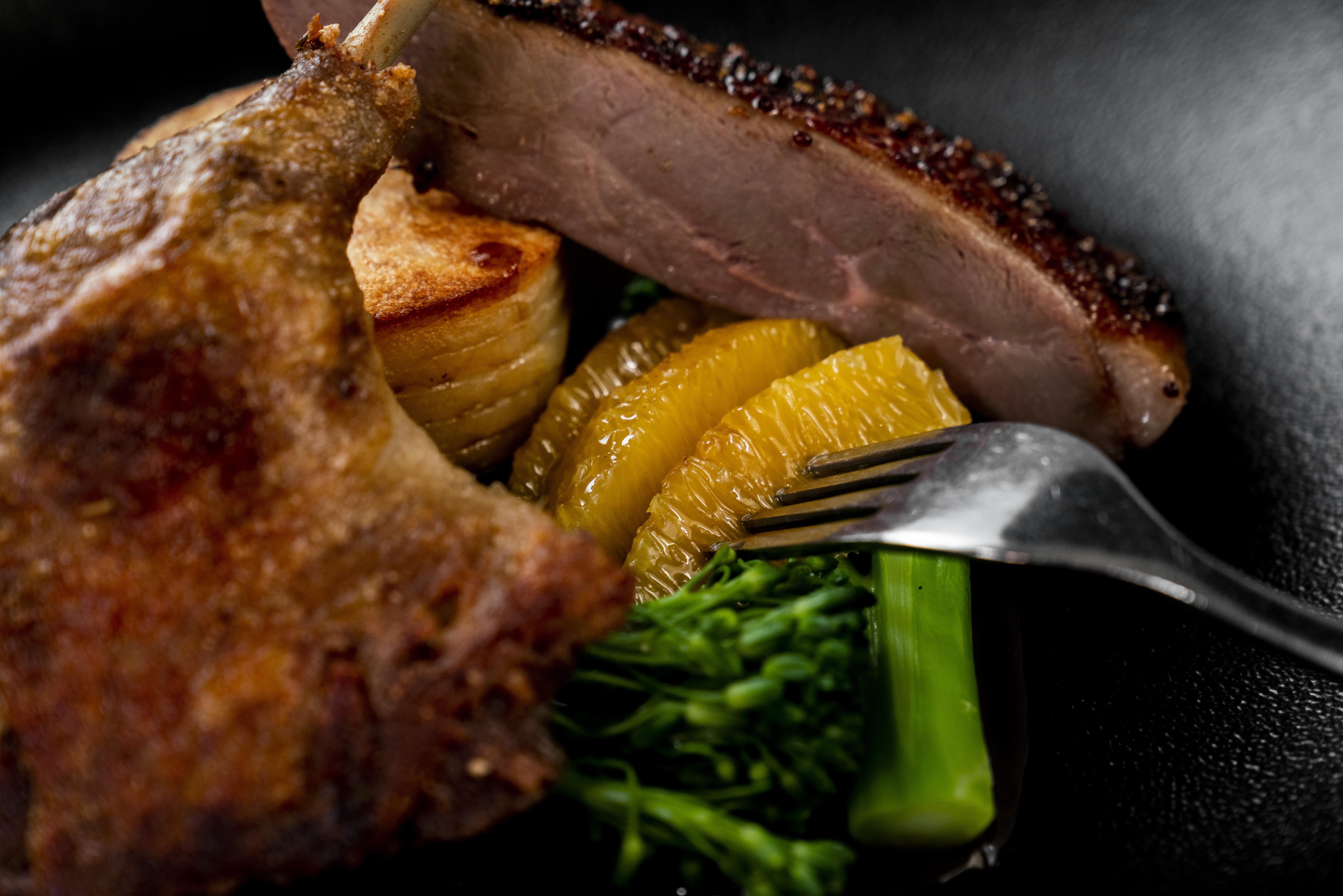 The Point Brisbane Hotel Eksteriør billede A duck confit with orange and vegetables